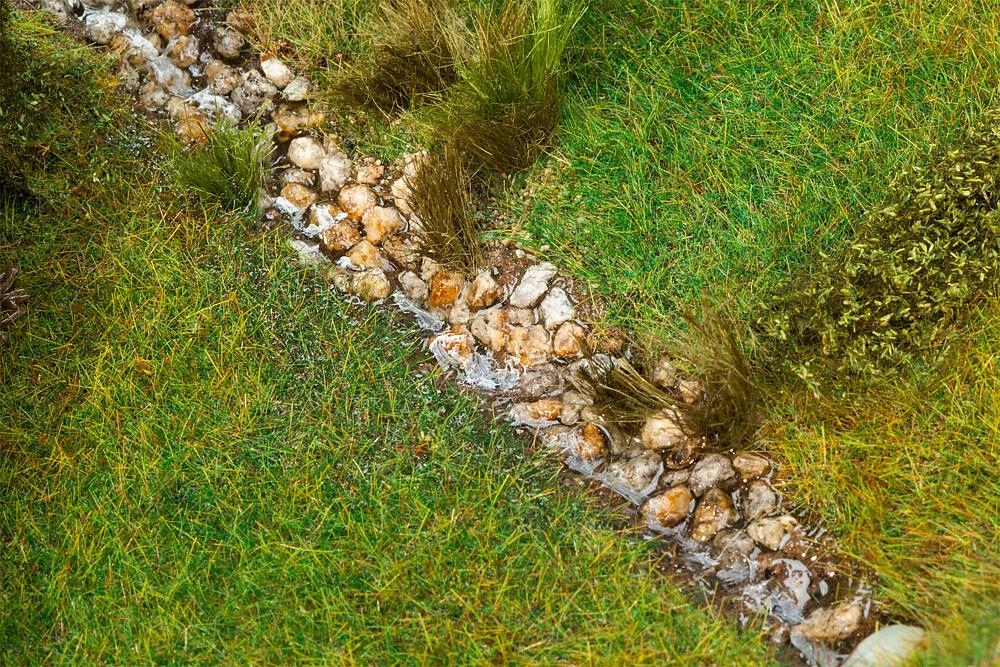Faller 170308 - Streumaterial Flusssteine, 60